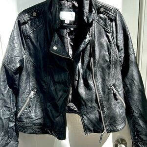 Adorable faux leather jacket with zipper detail